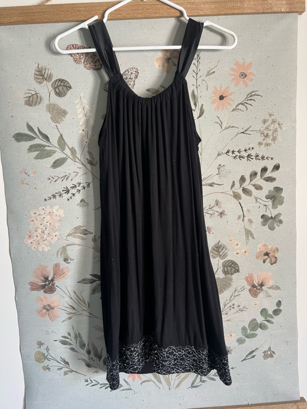 Express Black Sleeveless Knee-Length Dress with Embellished Hem